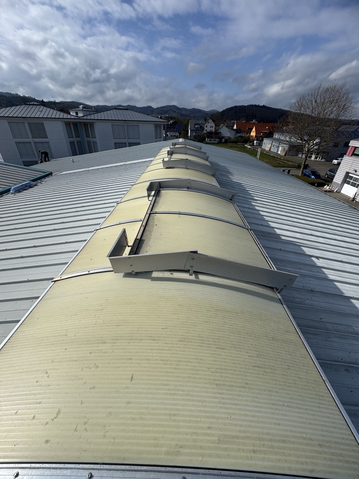 Rooflight before refurbishment – yellowed PC panels